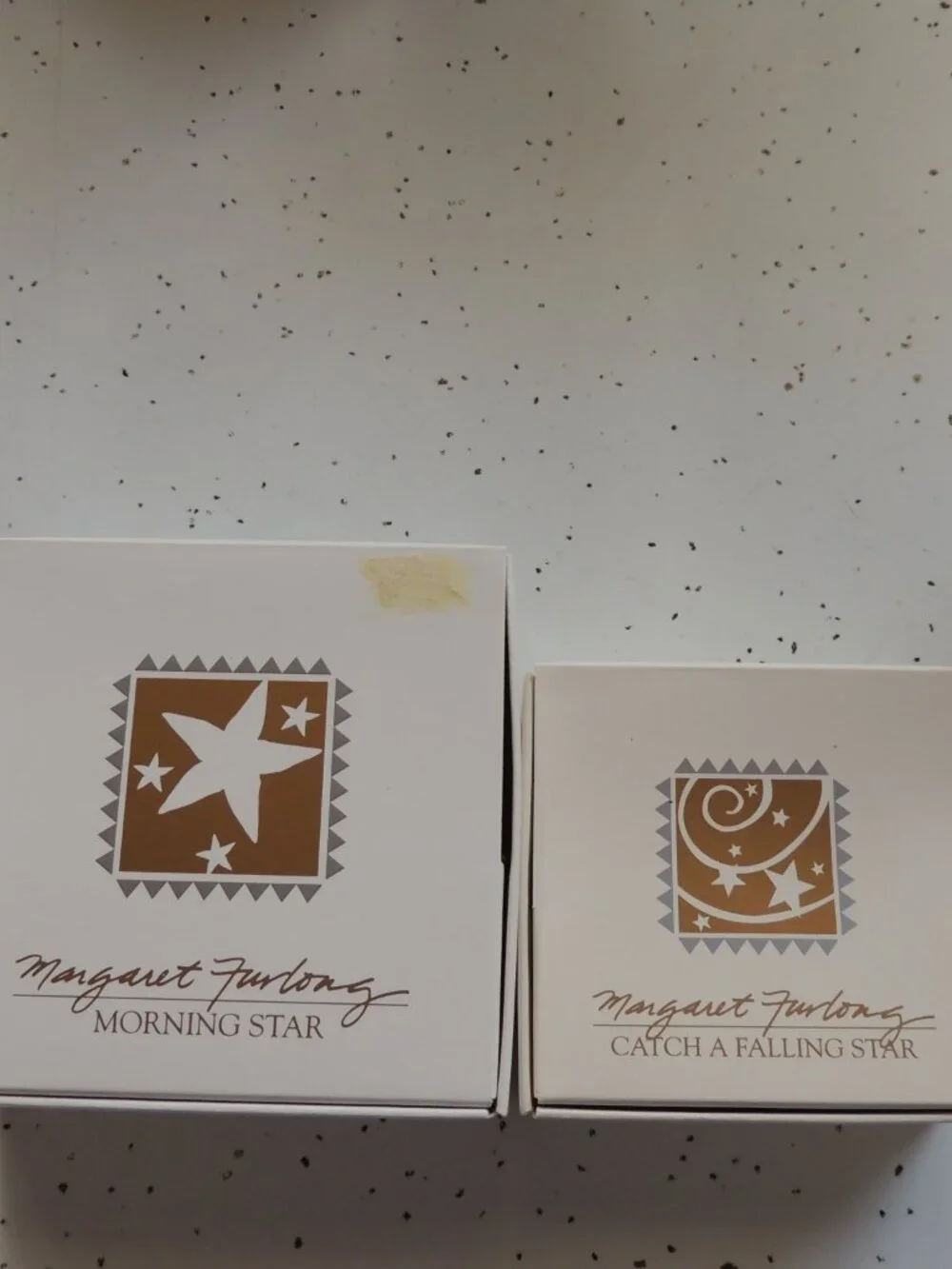 TWO Margaret Furlong star ornaments